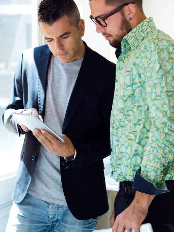 two young workers at office